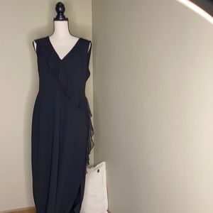 Black gown with ruffle details.